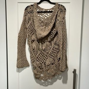 Hooded crochet beach cover up.